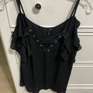 Express woman’s tank top with sleeves on the side